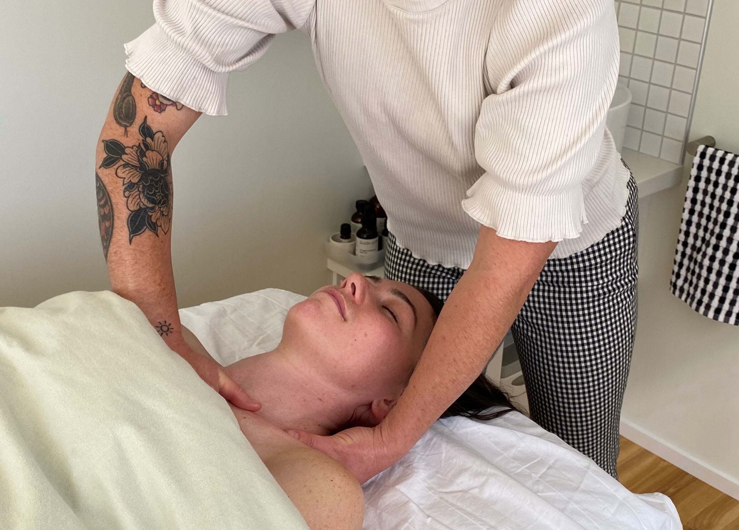 Relaxation massage at Innerbloom Holistic Skin Studio in Auckland, Auckland, NZ, promoting wellness and tranquility.