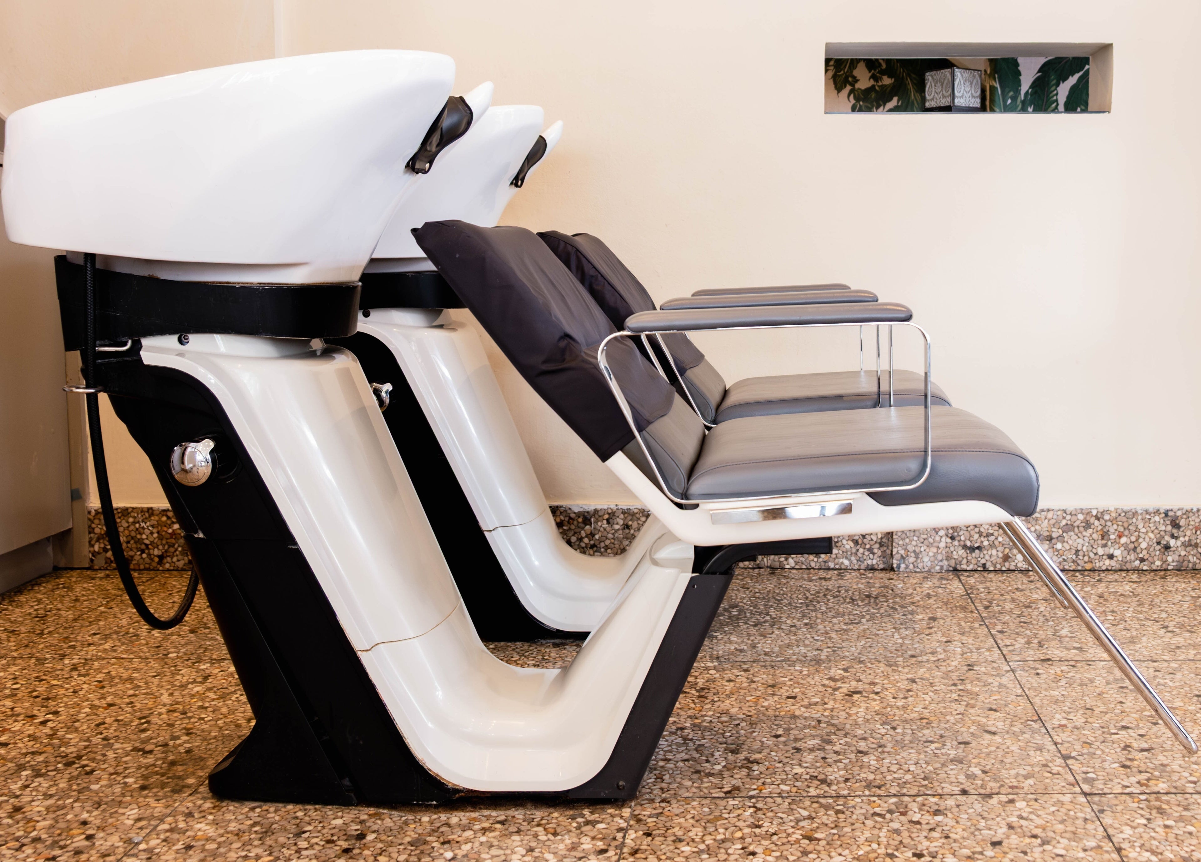 Sleek salon washchairs at Andrew Jose, London, England, GB, offering a modern and comfortable experience.