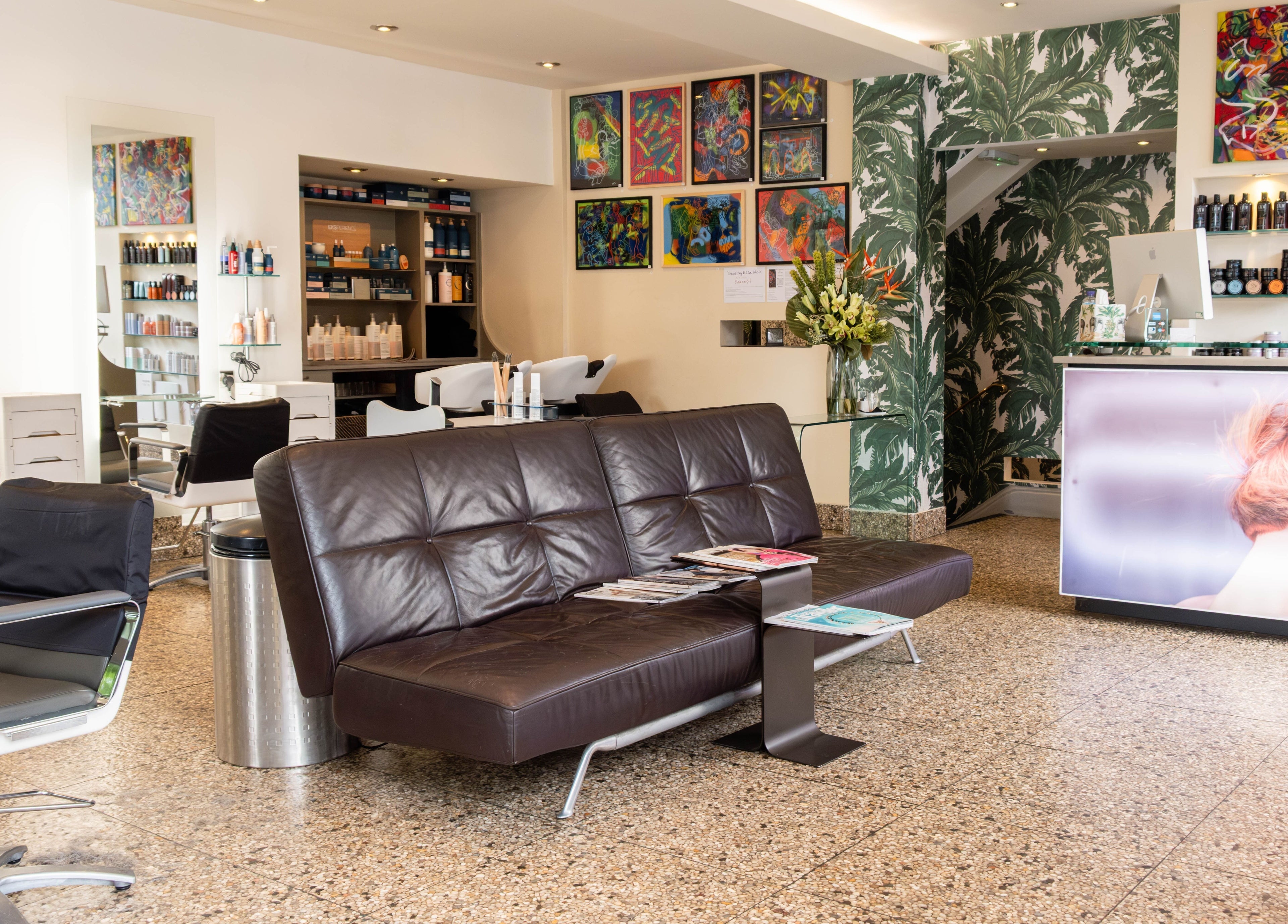 Andrew Jose's stylish salon in London, England, GB features modern decor and comfortable seating.