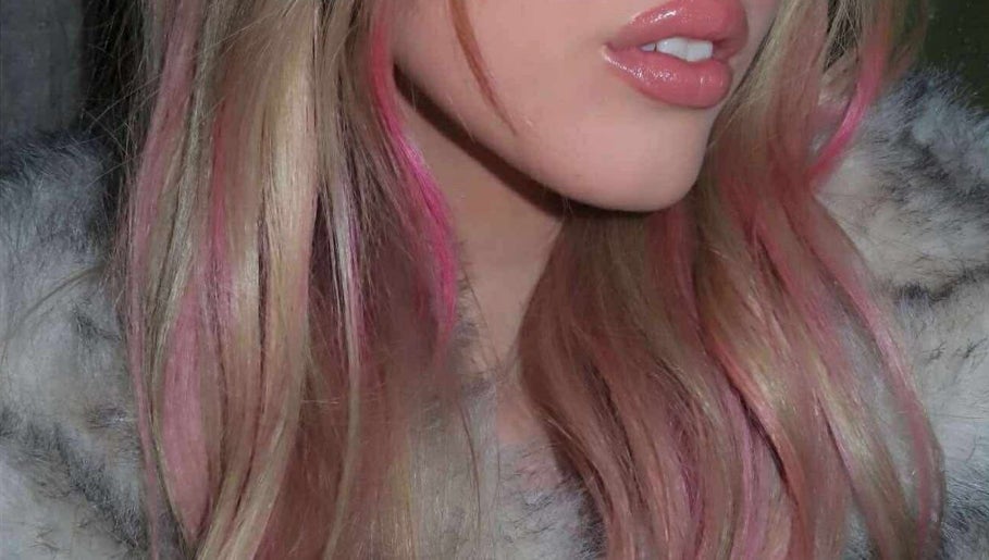Close-up of vibrant pink and blonde hair styled at Simone Hair Artistry, Melbourne, Victoria, AU.