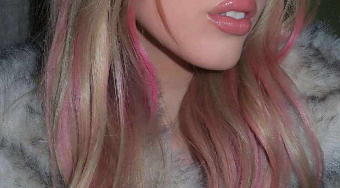 Close-up of vibrant pink and blonde hair styled at Simone Hair Artistry, Melbourne, Victoria, AU.