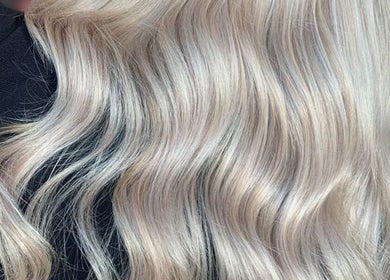 Elegant platinum waves hairstyling by Simone Hair Artistry in Melbourne, Victoria, AU. Perfect for a sleek, polished look.