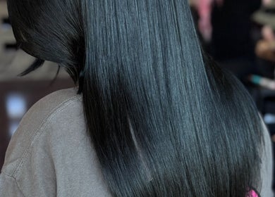 Smooth, shiny hair styled at Simone Hair Artistry in Melbourne, Victoria, AU.