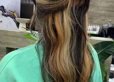 Back view of vibrant hair highlights at Simone Hair Artistry, Melbourne, Victoria, AU, showcasing salon style.