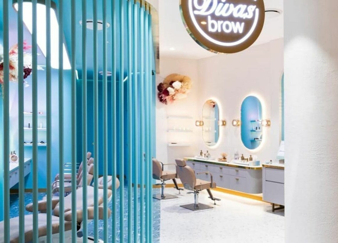 Interior of Divas Brow Eastgardens salon in Eastgardens, New South Wales, AU, featuring modern decor and styling chairs.