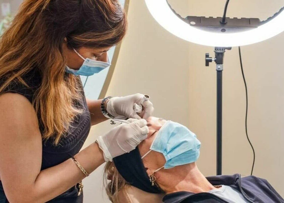 Technician performing brow treatment at Divas Brow Eastgardens, Eastgardens, New South Wales, AU.