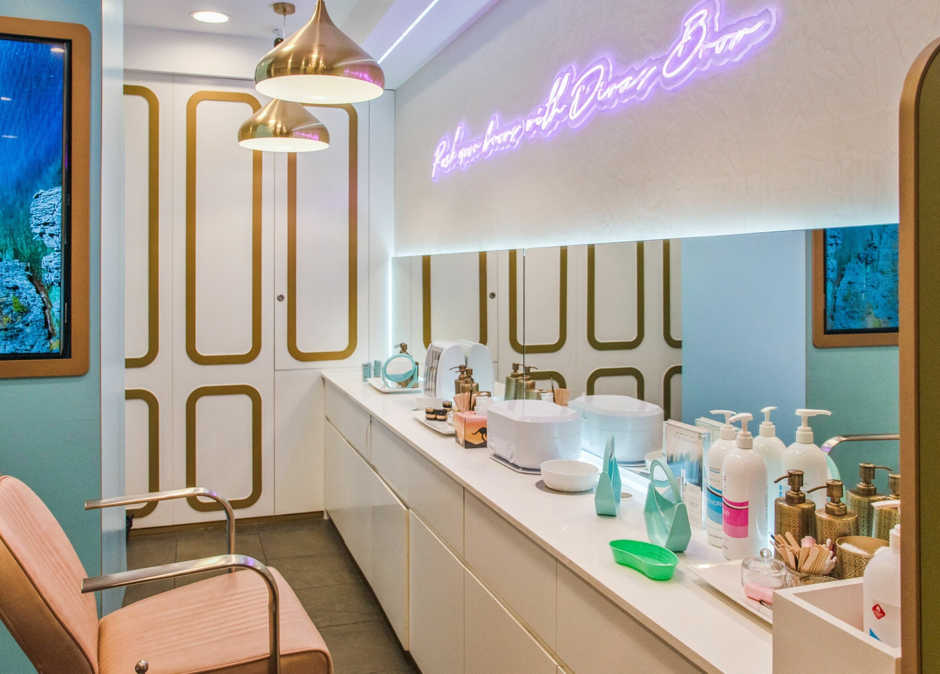 Luxurious interior of Divas Brow Sydney CBD beauty salon in Sydney, New South Wales, AU, with chic decor and seating.