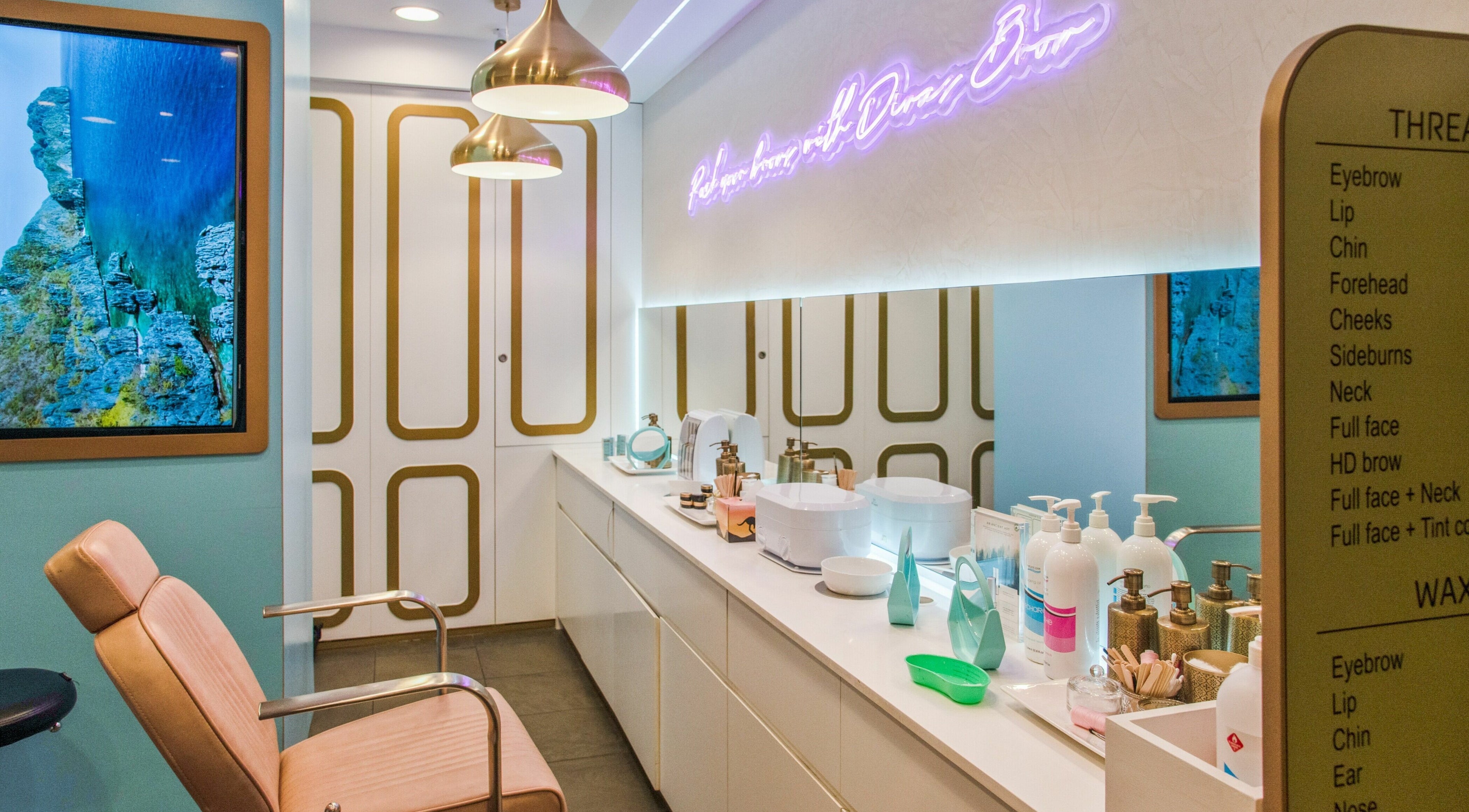 Luxurious interior of Divas Brow Sydney CBD beauty salon in Sydney, New South Wales, AU, with chic decor and seating.