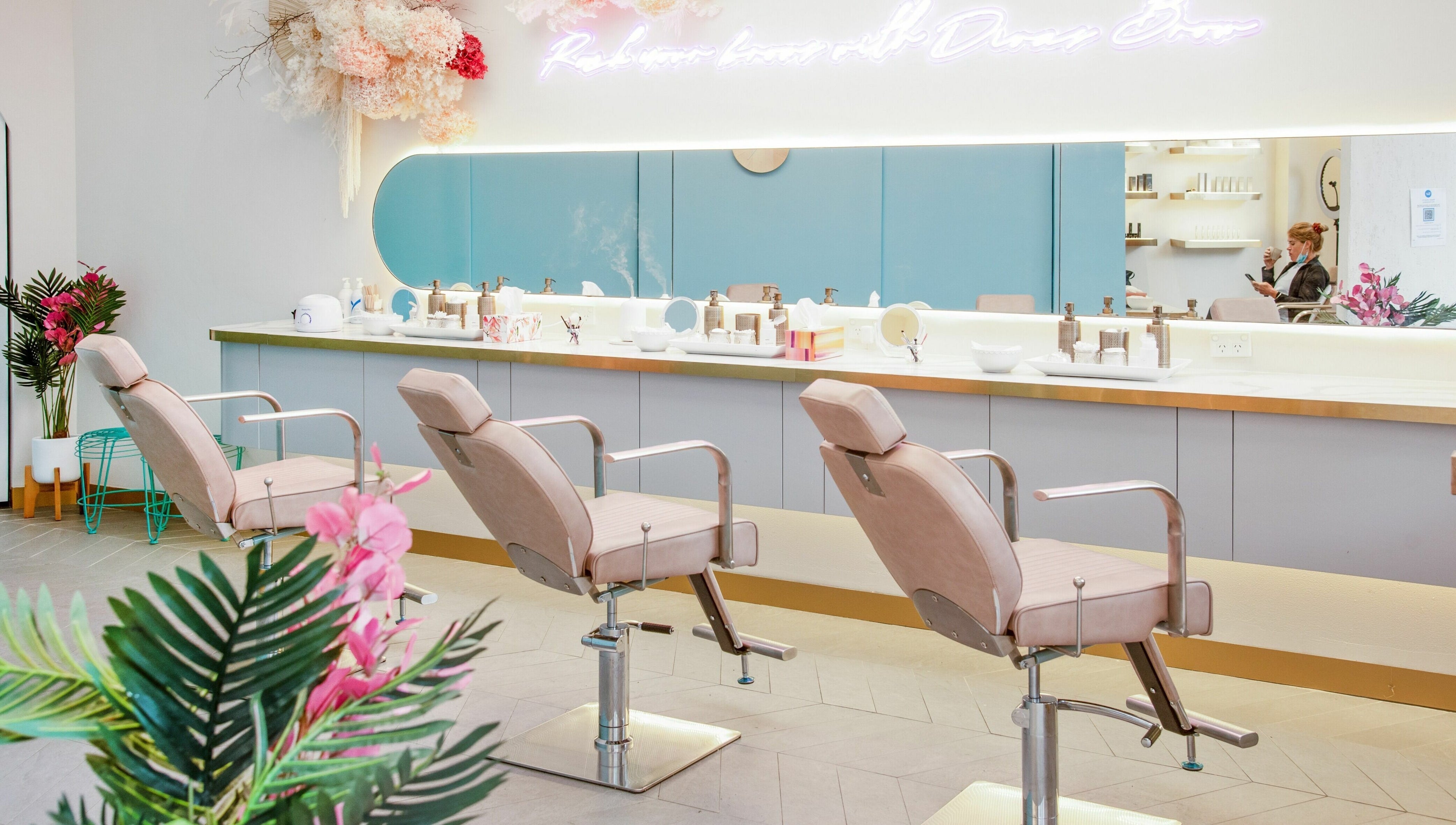 Elegant salon interior at Divas Brow Warringah Mall, Brookvale, New South Wales, AU with chic styling chairs.
