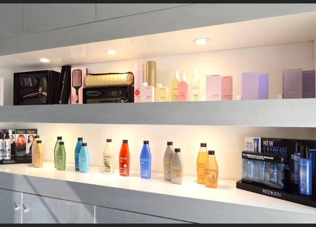 Beauty products displayed on a stylish shelf at Italian Inspiration, Woking, England, GB.