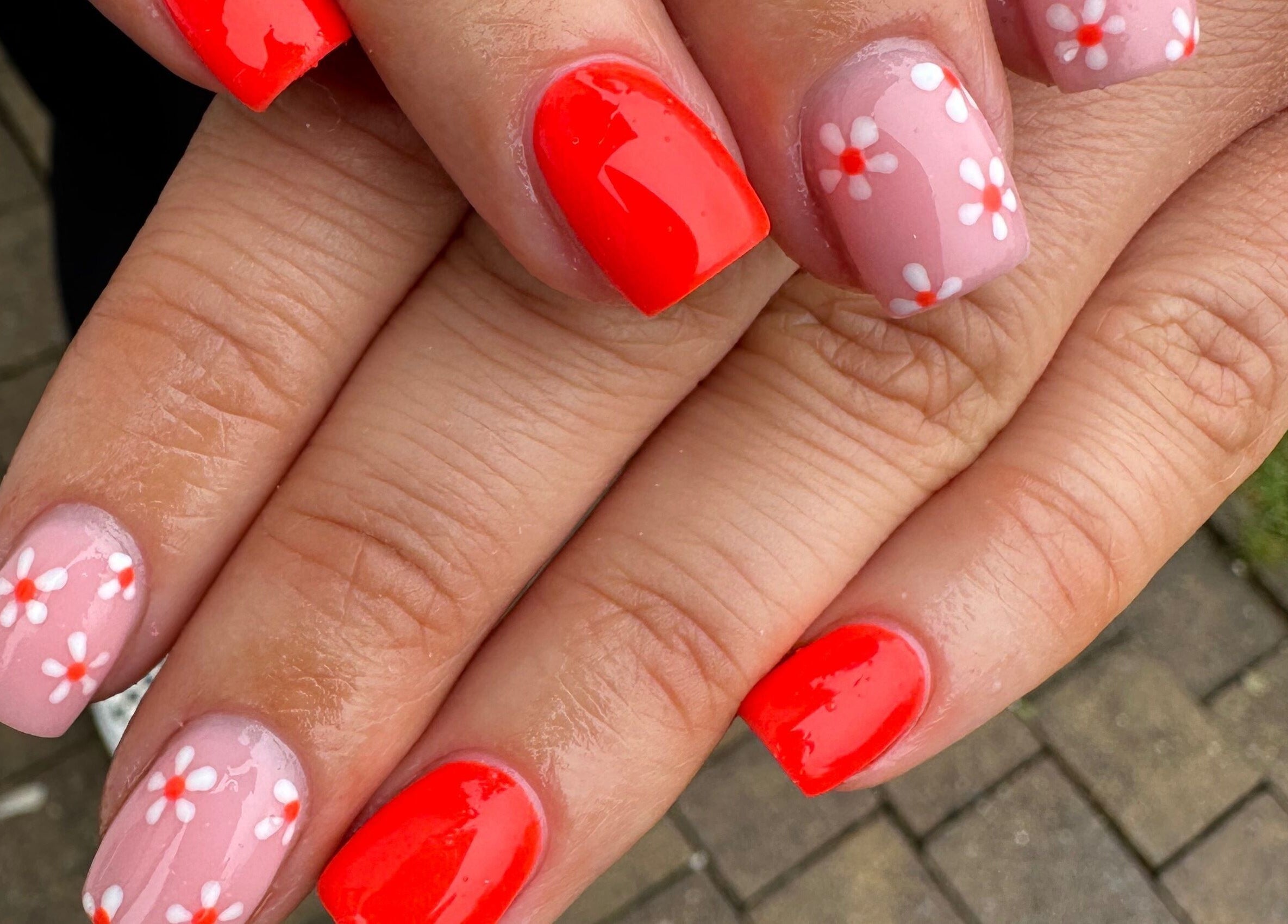 Floral and glossy nails at Suzanne Letsome Beauty in Wexford, County Wexford, IE.