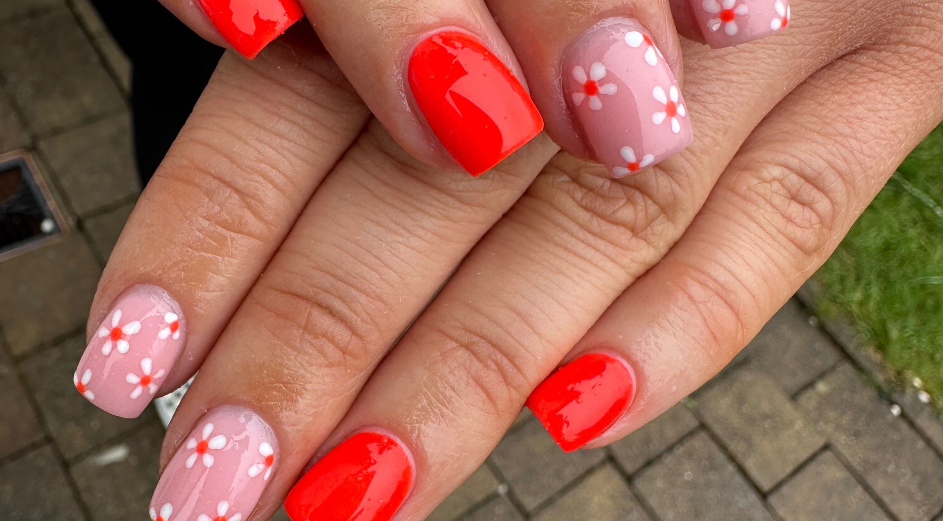Floral and glossy nails at Suzanne Letsome Beauty in Wexford, County Wexford, IE.
