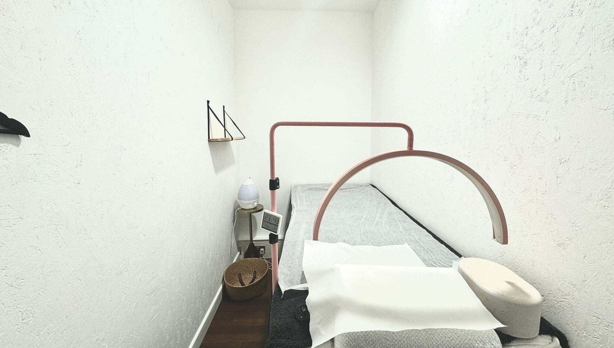 Cozy treatment room at Wish. Beaute Japanese Lashes Soho, London, England, showcasing a minimalist aesthetic.