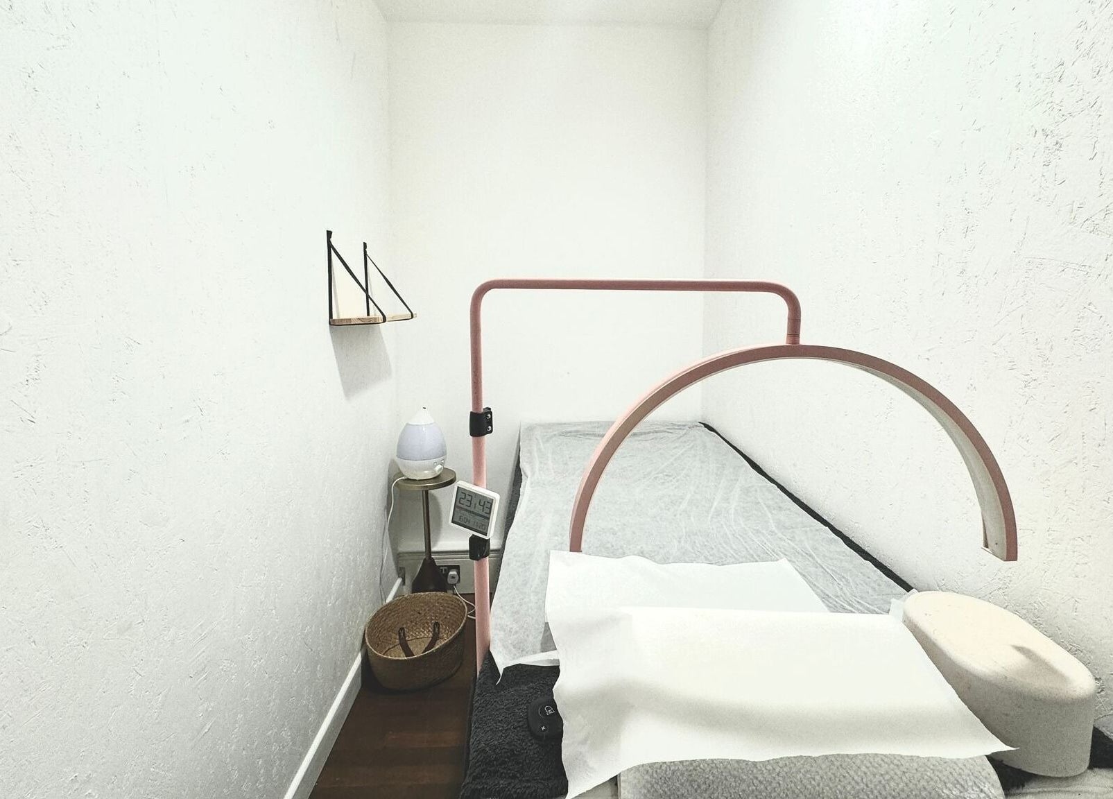 Cozy treatment room at Wish. Beaute Japanese Lashes Soho, London, England, showcasing a minimalist aesthetic.
