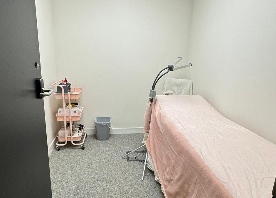 Cozy treatment room at (Closed) Battersea - Wish Beaute in London, England, GB, featuring a pink cover.