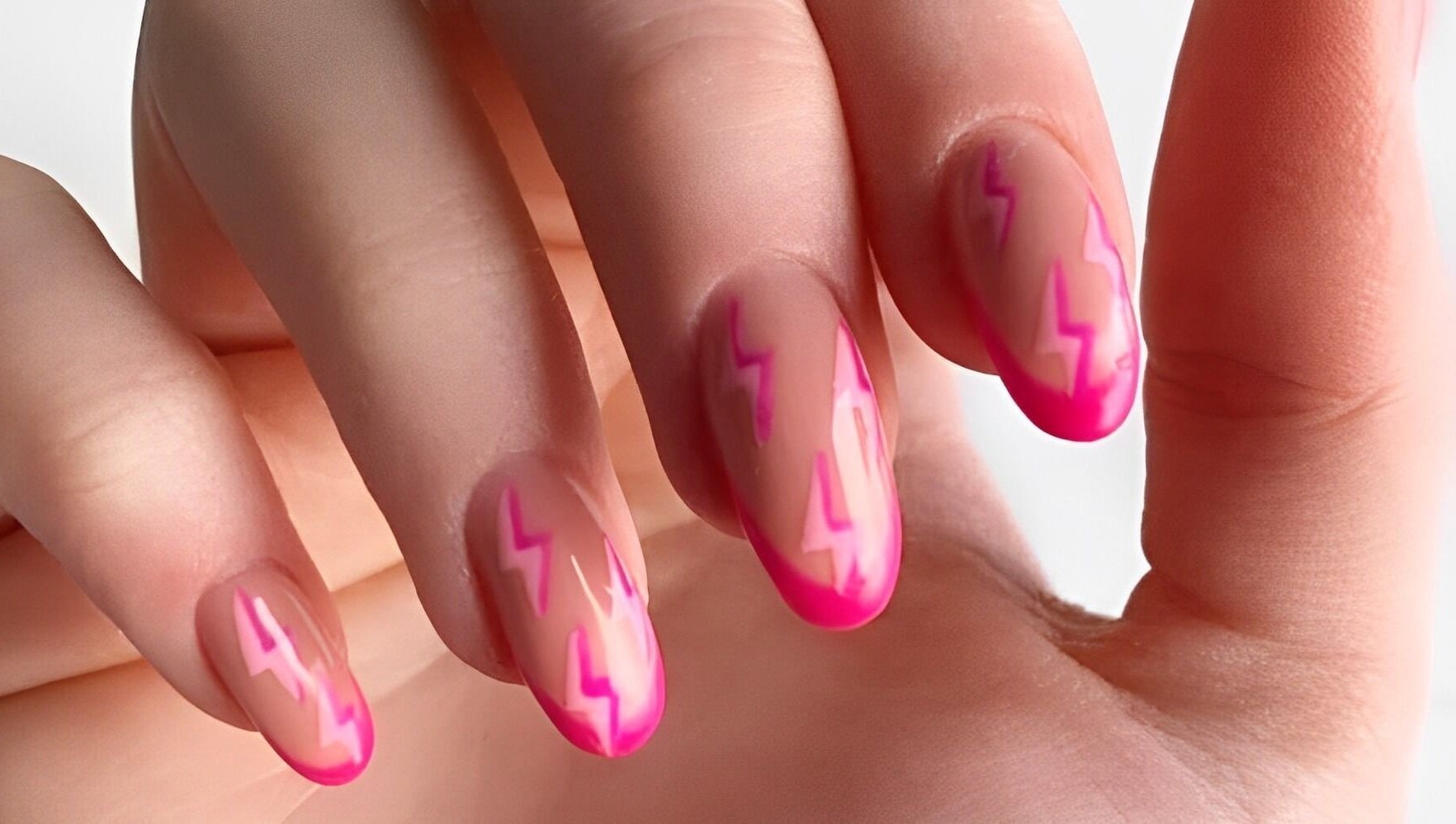 Vibrant pink lightning nail art at Wondernails by Jojo, Glasgow, Scotland, GB.