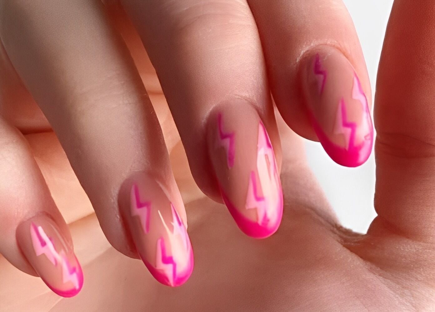 Vibrant pink lightning nail art at Wondernails by Jojo, Glasgow, Scotland, GB.