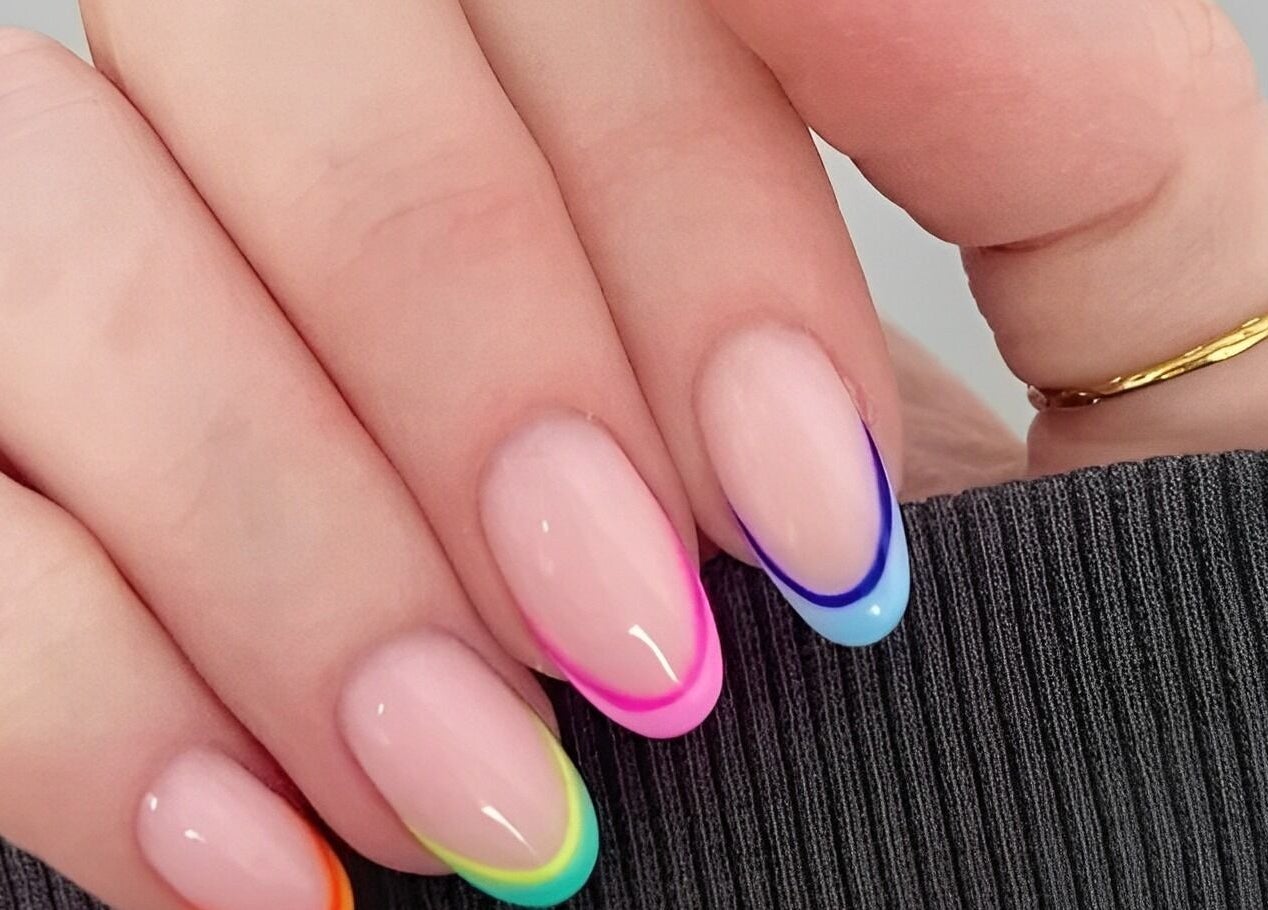 Colorful nail art on display at Wondernails by Jojo, Glasgow, Scotland, GB. Bright, trendy design.