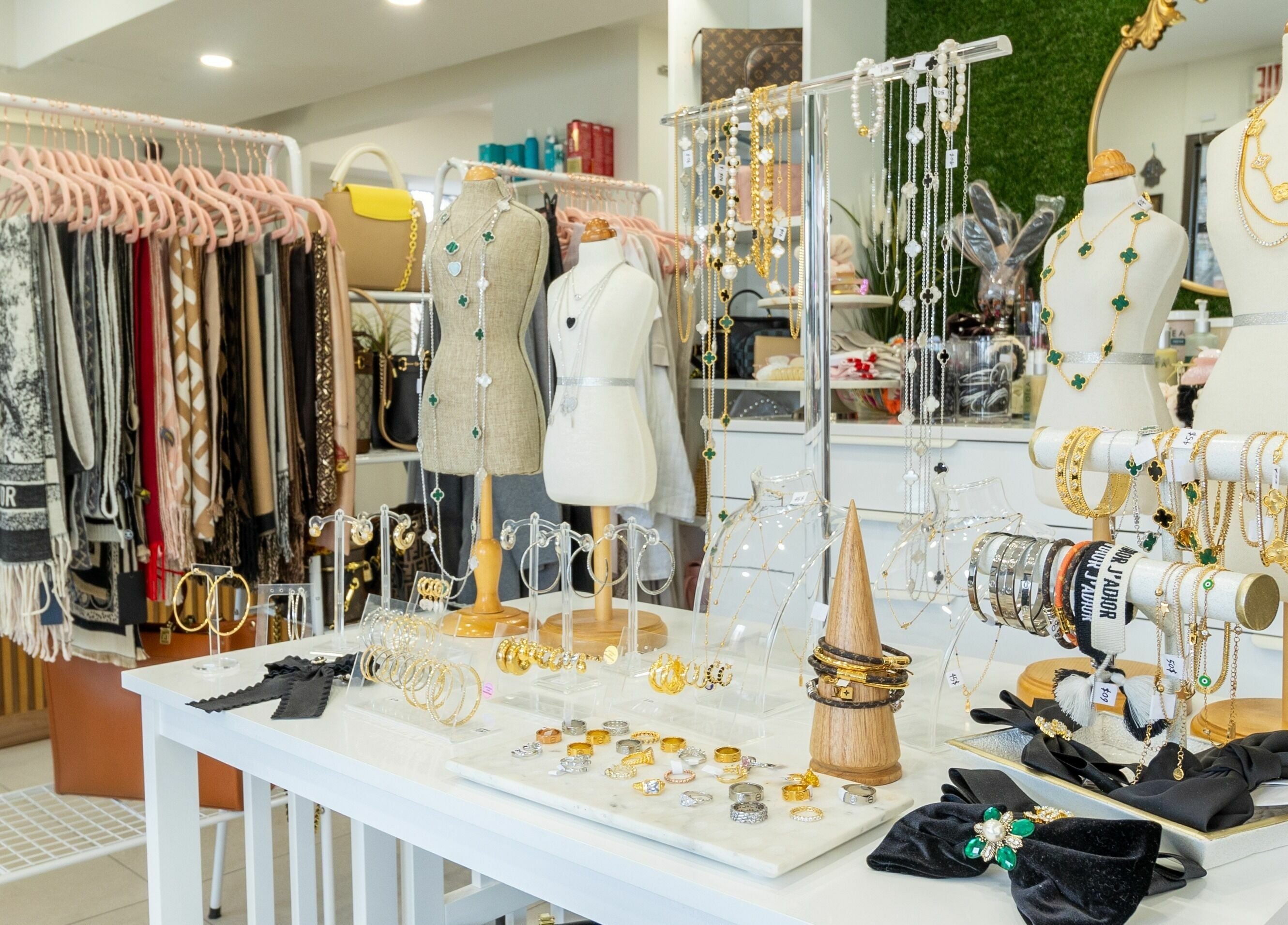 Jewelry and scarf display at Lolita Beaute, showcasing style in Montréal, Québec, CA.