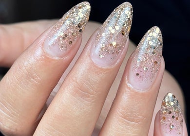Glittering gold nail design by Lauren Danielle Nail Artist in Andover, England, GB.
