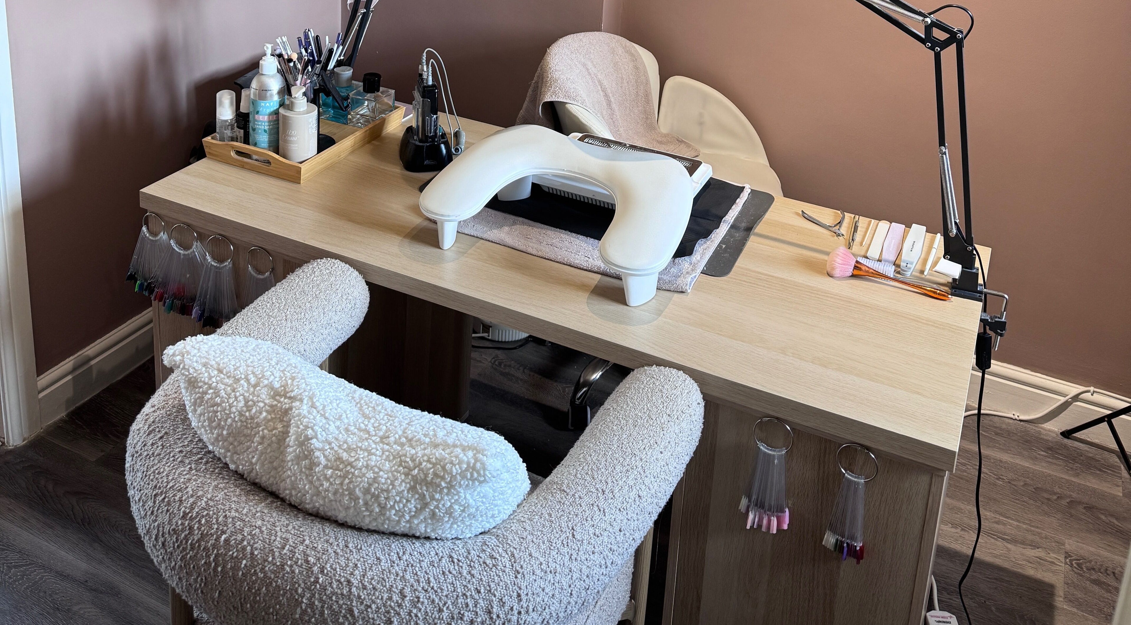 Elegant nail station at Lauren Danielle Nail Artist, Andover, England, GB with stylish tools and decor.