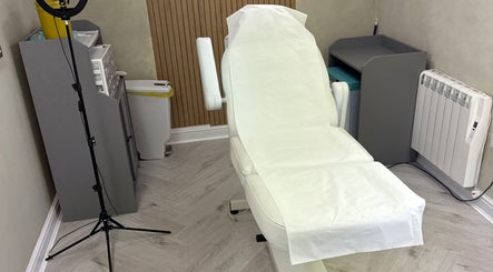 Treatment room at Karen Brereton Aesthetics in Loughborough, England, GB, featuring a treatment chair.