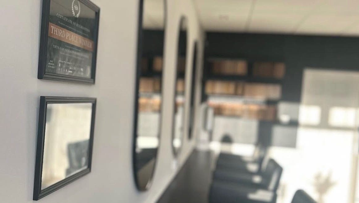 Elegant interior of Jemma Louise Hair Extensions, Grantham, England, GB, featuring stylish mirrors.