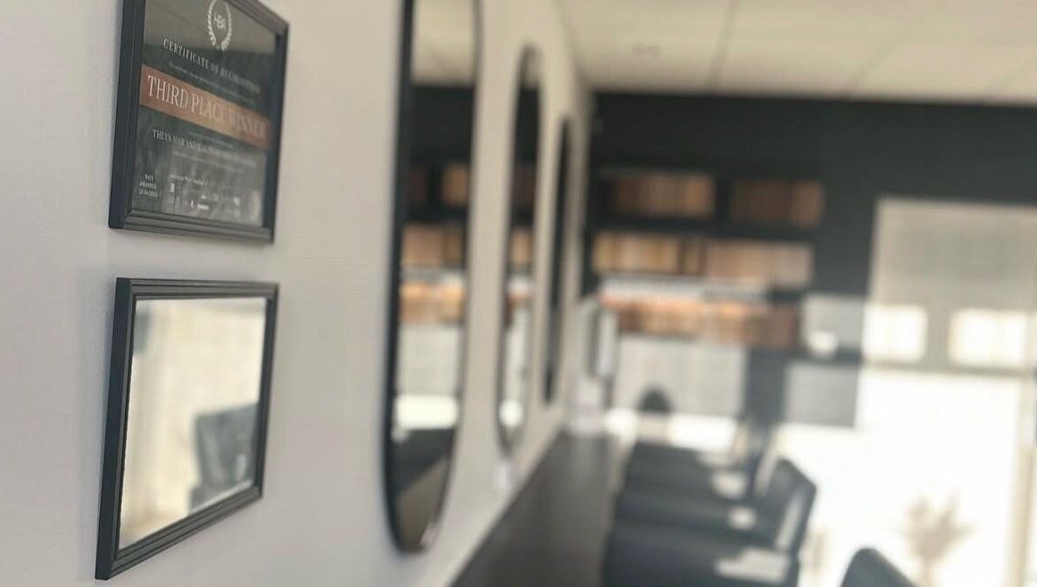 Elegant interior of Jemma Louise Hair Extensions, Grantham, England, GB, featuring stylish mirrors.