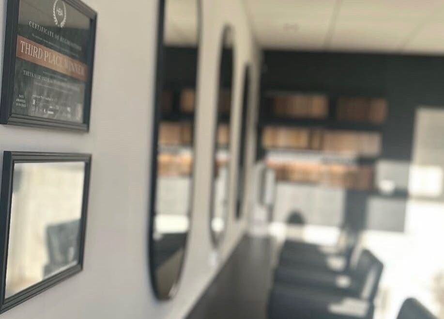 Elegant interior of Jemma Louise Hair Extensions, Grantham, England, GB, featuring stylish mirrors.