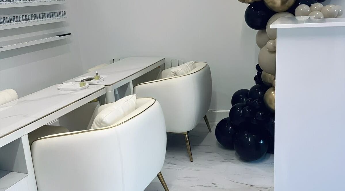 Chic nail stations at AM Beauty Studios Kingsknowe, Edinburgh, Scotland, GB. Elegant white chairs and decor.