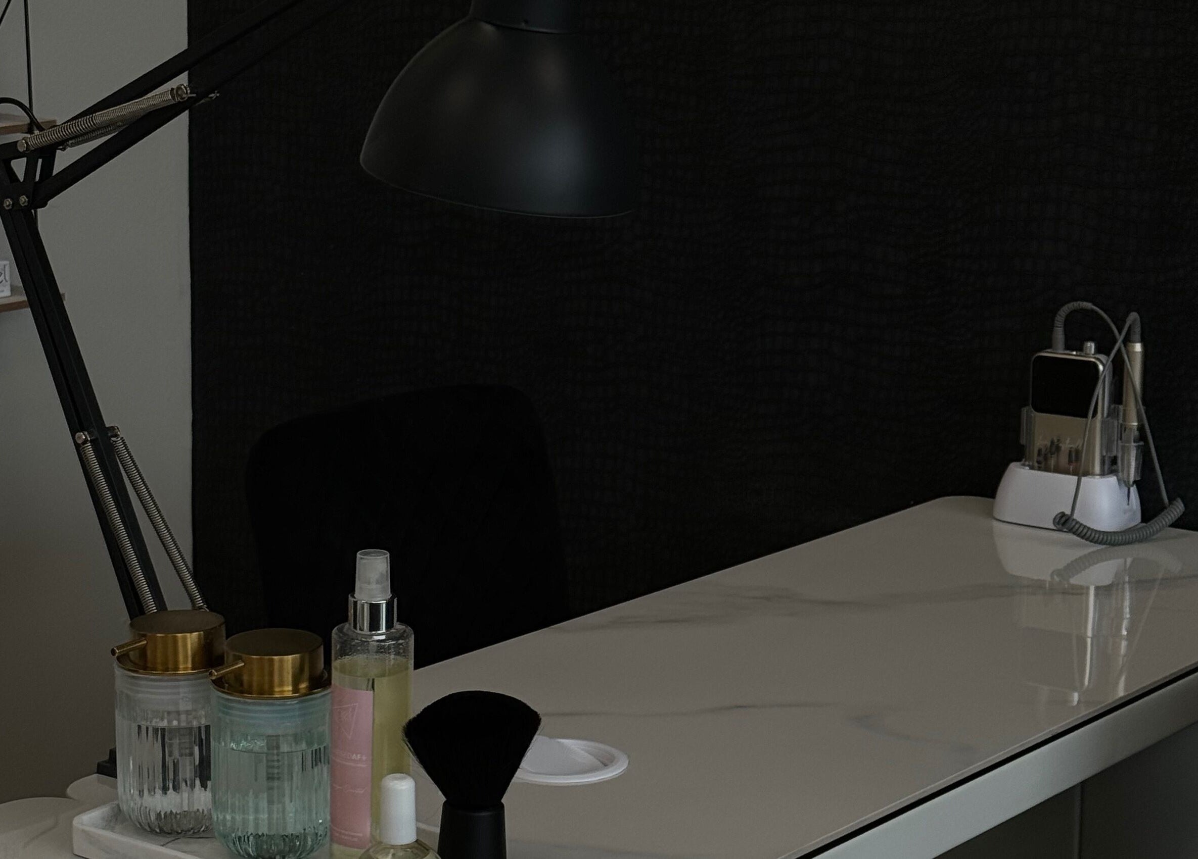 Stylish nail care station at AM Beauty Studios Kingsknowe, Edinburgh, Scotland, GB, showcasing manicure tools.