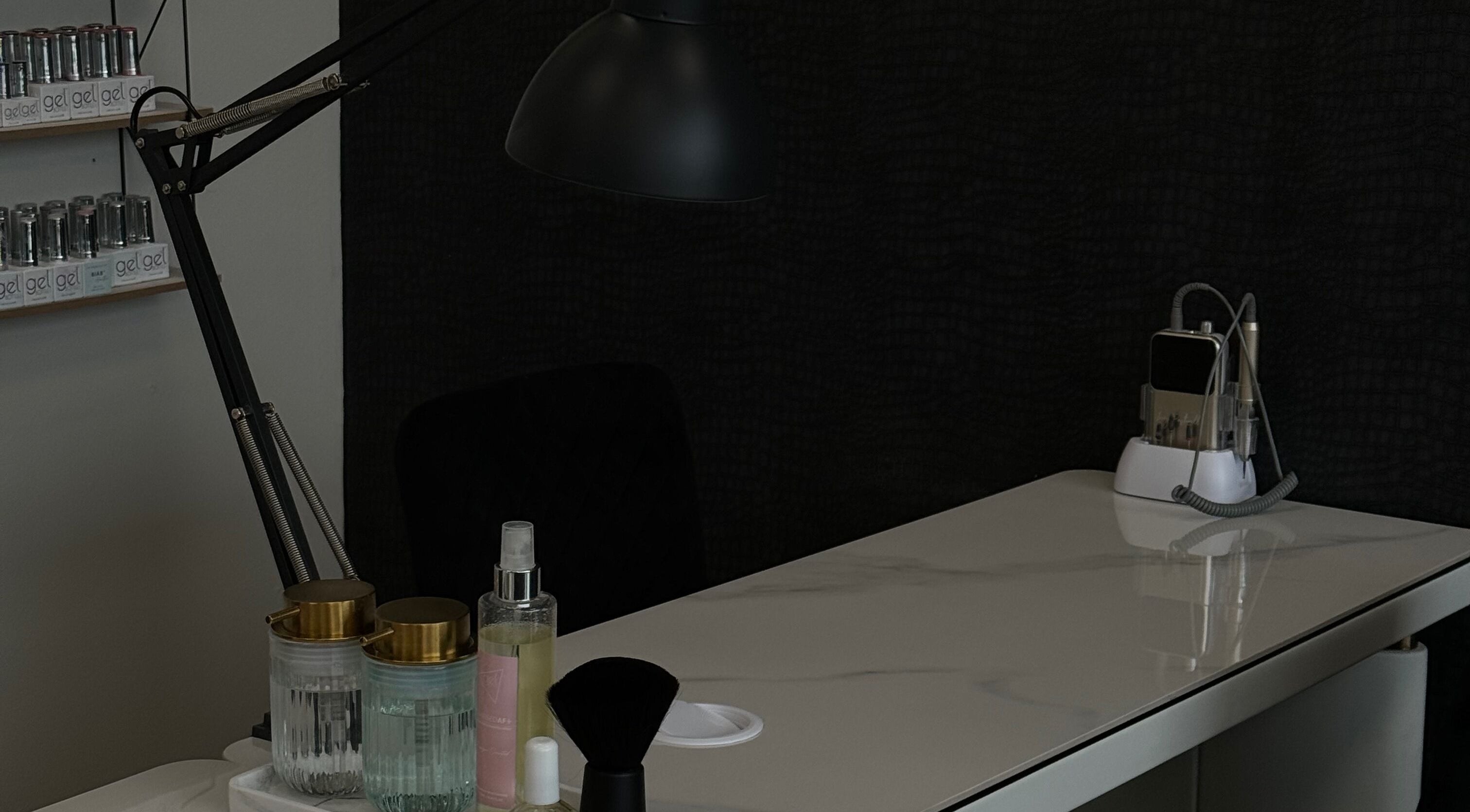 Stylish nail care station at AM Beauty Studios Kingsknowe, Edinburgh, Scotland, GB, showcasing manicure tools.