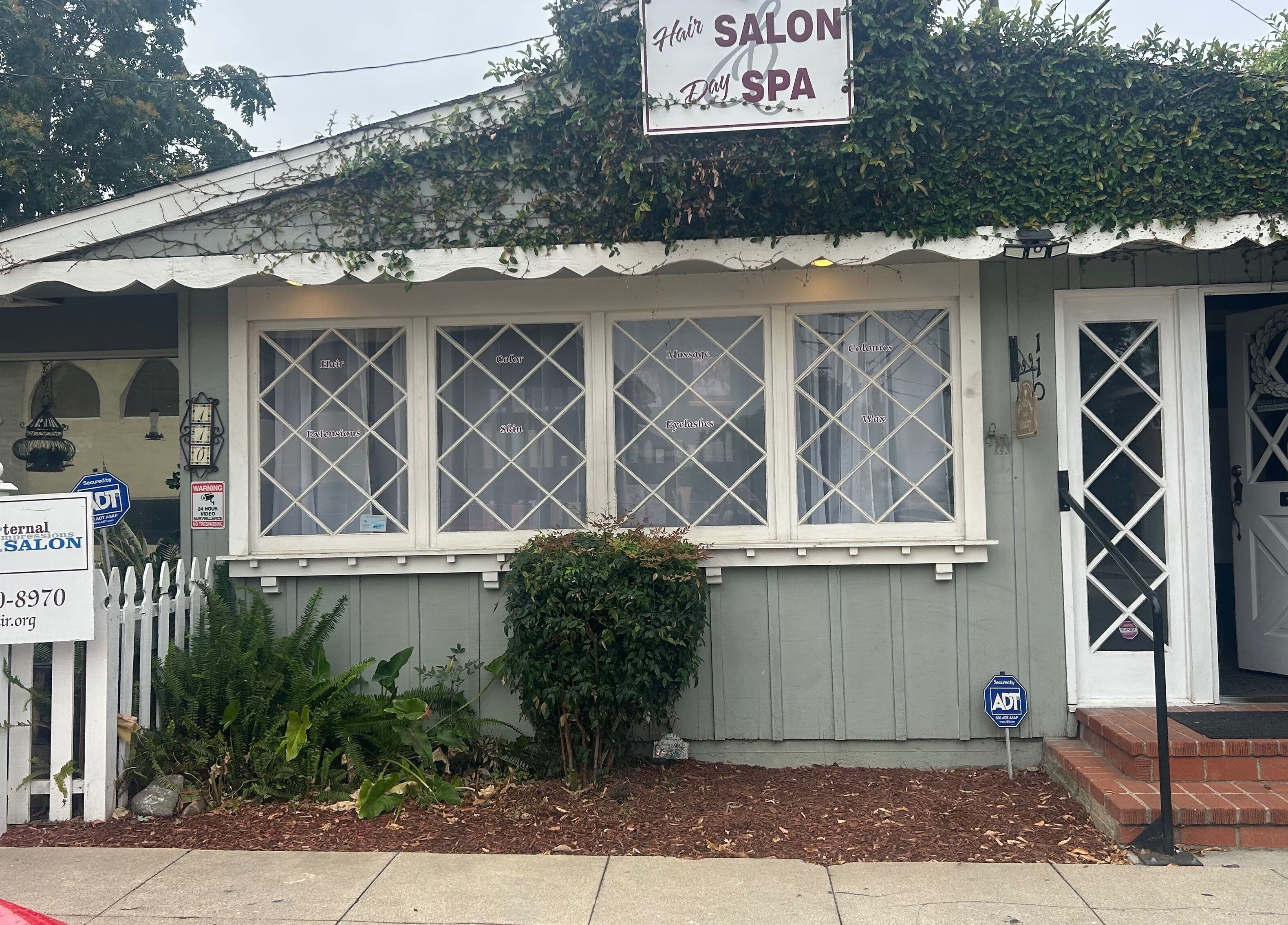 Charming exterior of 807 W Grand Blvd Ste C, a beauty venue in Corona, California, US, adorned with vines.