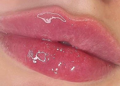 Close-up of glossy lips enhancement at AE Clinics - Abigael Eva (Sudbury), Sudbury, England, GB.