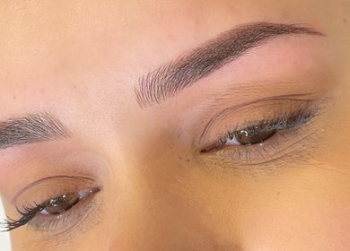 Perfectly shaped eyebrows at AE Clinics - Abigael Eva in Colchester, England, GB, showcasing expert care.