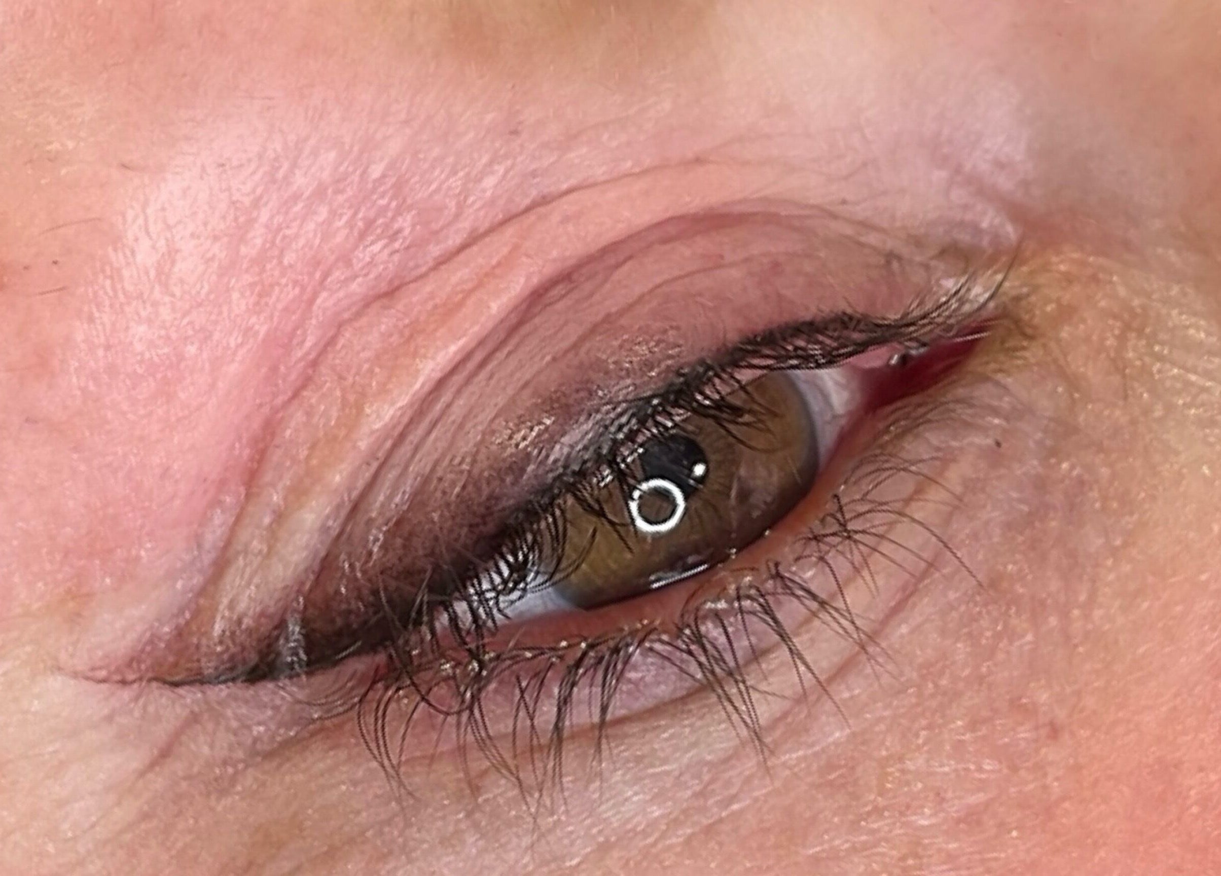 Close-up of enhanced eye showcasing makeup at AE Clinics, Haverhill, England, GB.