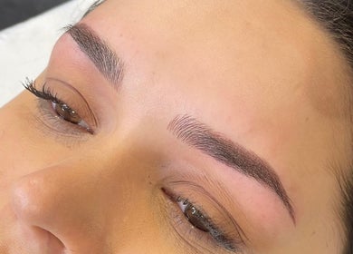 Close-up of professionally shaped eyebrows at AE Clinics (Sudbury), Sudbury, England, GB.
