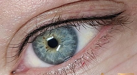 Close-up of a detailed eye showcasing beauty services at AE Clinics (Sudbury), Sudbury, England, GB.