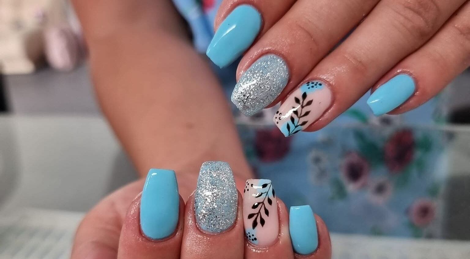 Elegant blue and silver nail art at Apple Blossom, Cape Town, Western Cape, ZA.