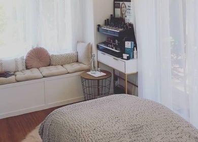 Inviting room at Inside Out Beauty, Waipapa, Northland, NZ with comfy bench and makeup station.
