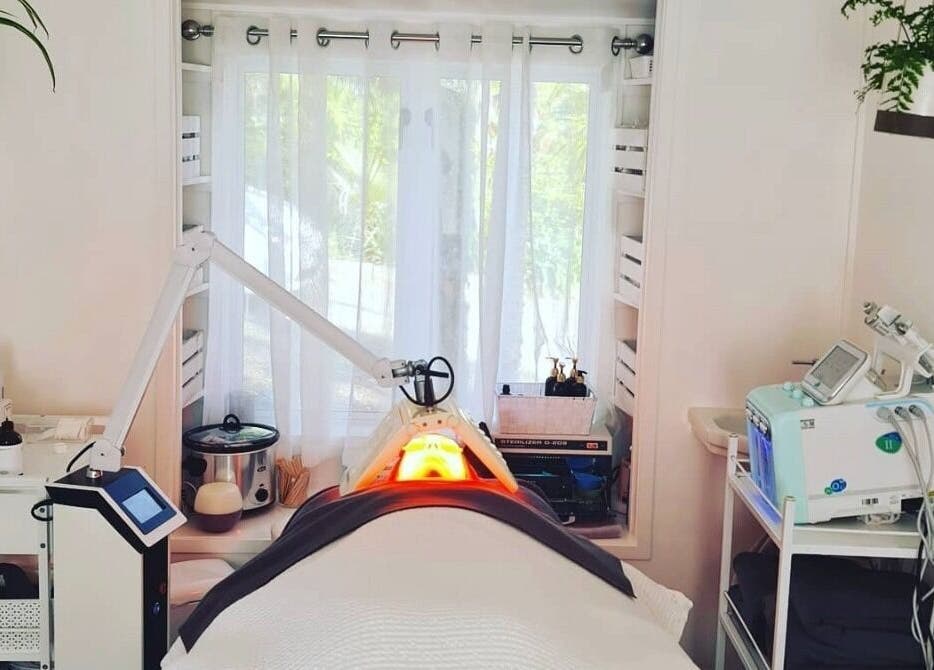 Inside Out Beauty's therapy room in Waipapa, Northland, NZ featuring modern skincare equipment and a peaceful ambiance.