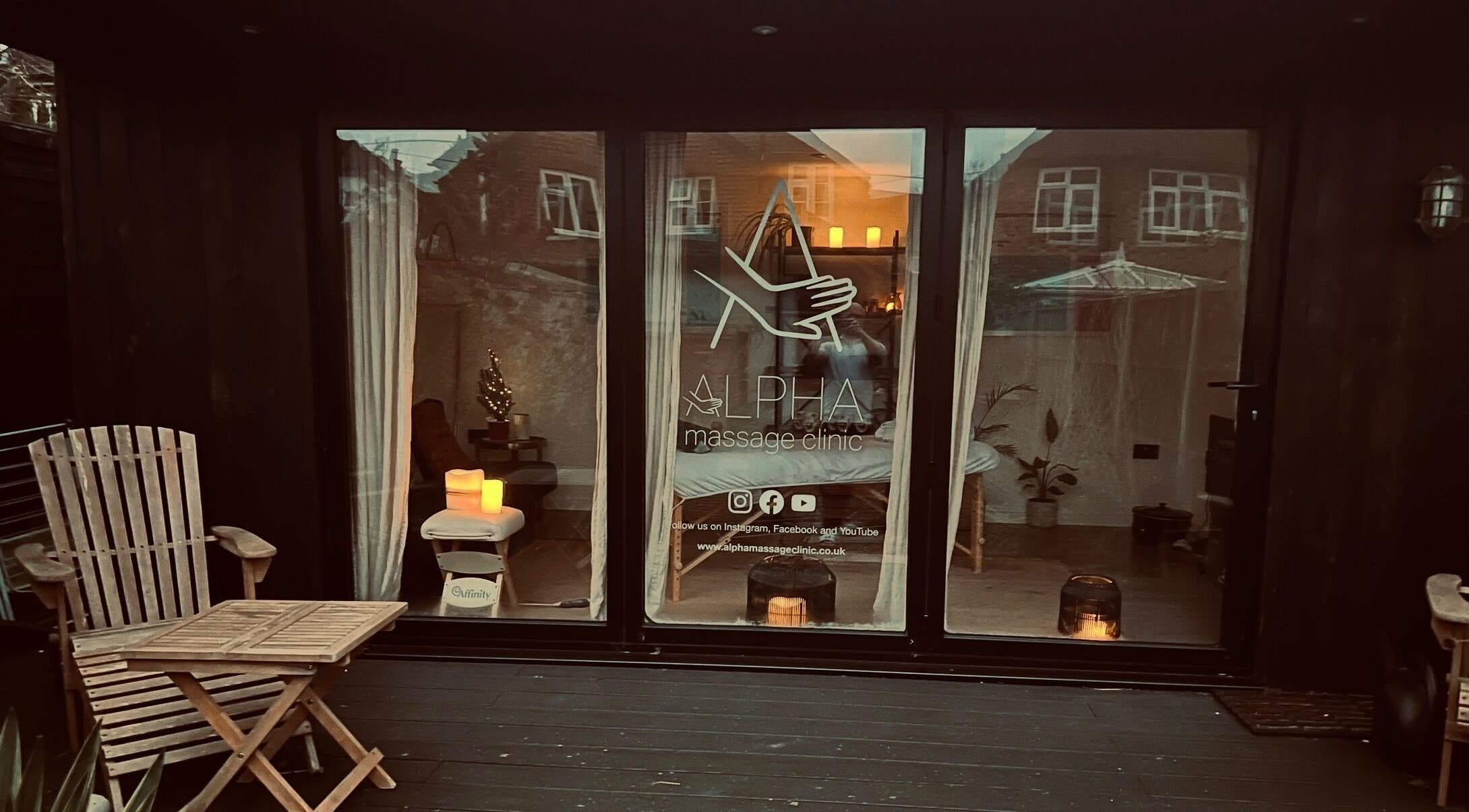 Inviting entrance of Alpha Massage - Chobham Clinic, Chobham, England, GB with cozy decor and warm lighting.