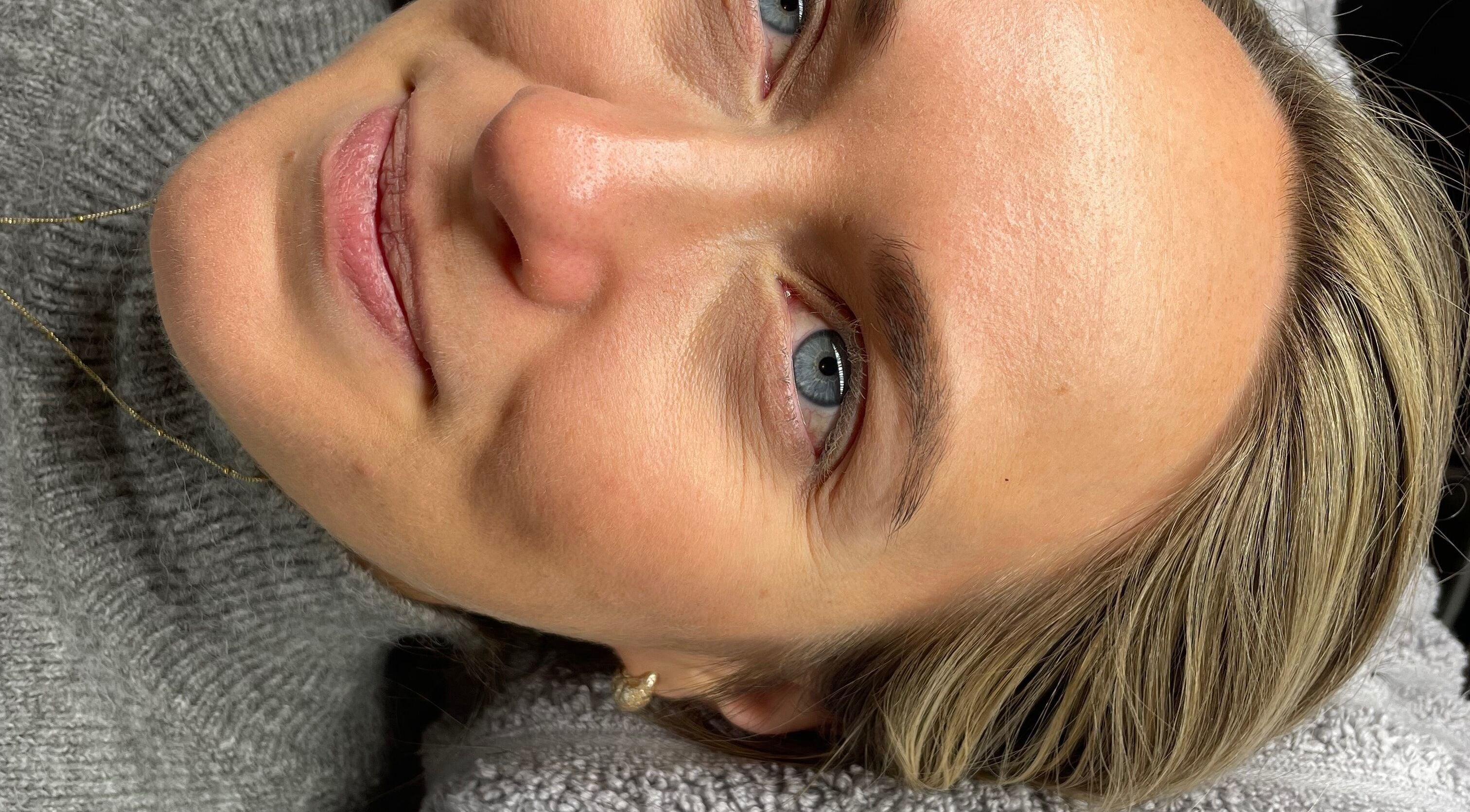 Relaxed guest enjoying treatment at Bella’s Beauty in Exmouth, England, GB.