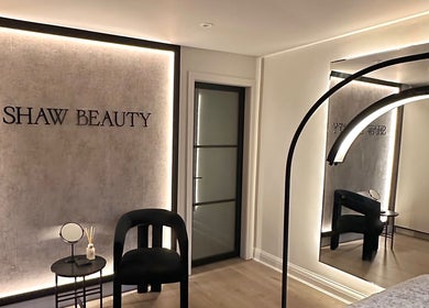 Modern interior at Shaw Beauty, Sandbach, England, GB showcasing elegant minimalist design with lighting.