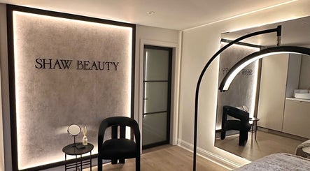 Modern interior at Shaw Beauty, Sandbach, England, GB showcasing elegant minimalist design with lighting.