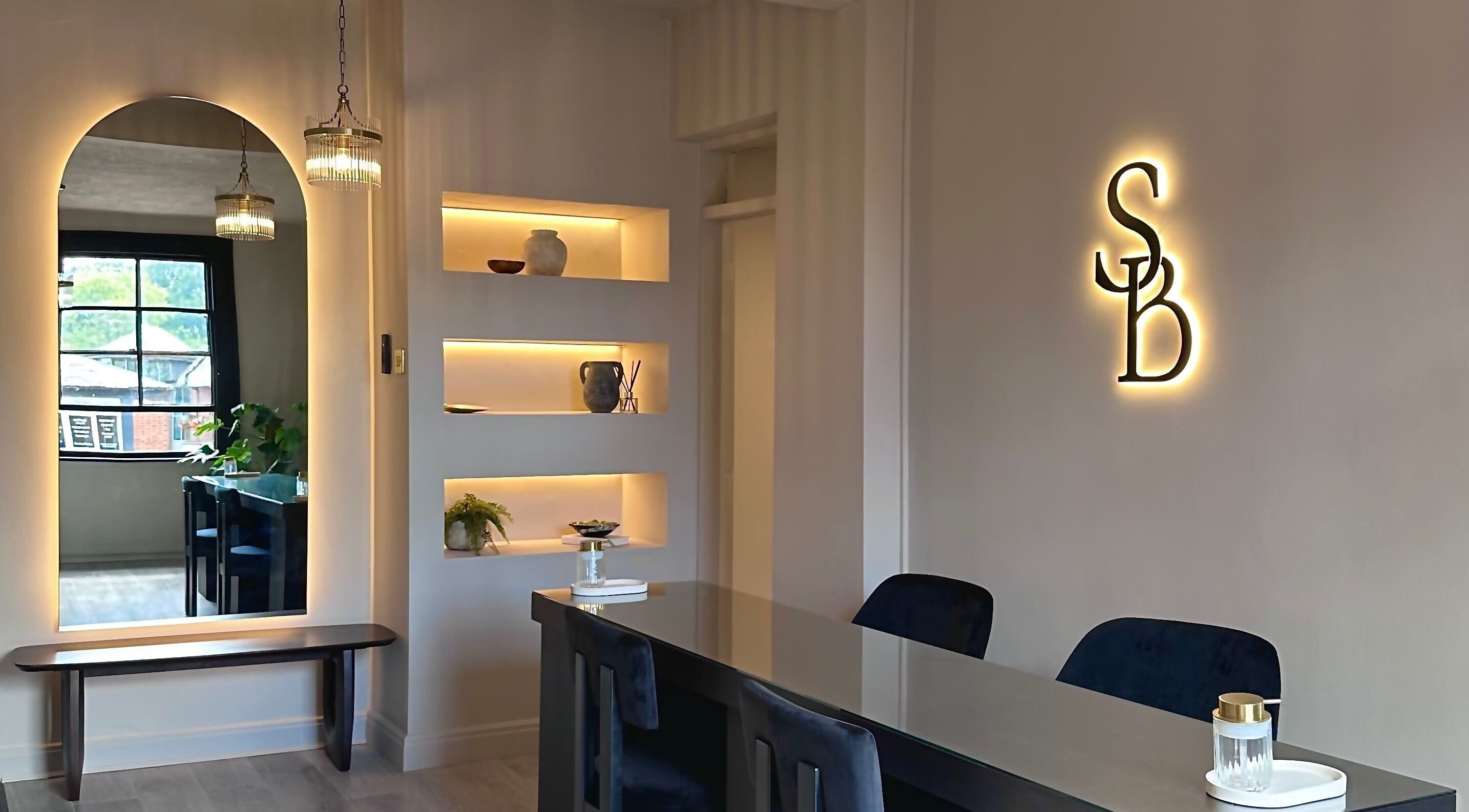 Modern interior of Shaw Beauty, Sandbach, England, GB, with elegant decor and soft lighting.