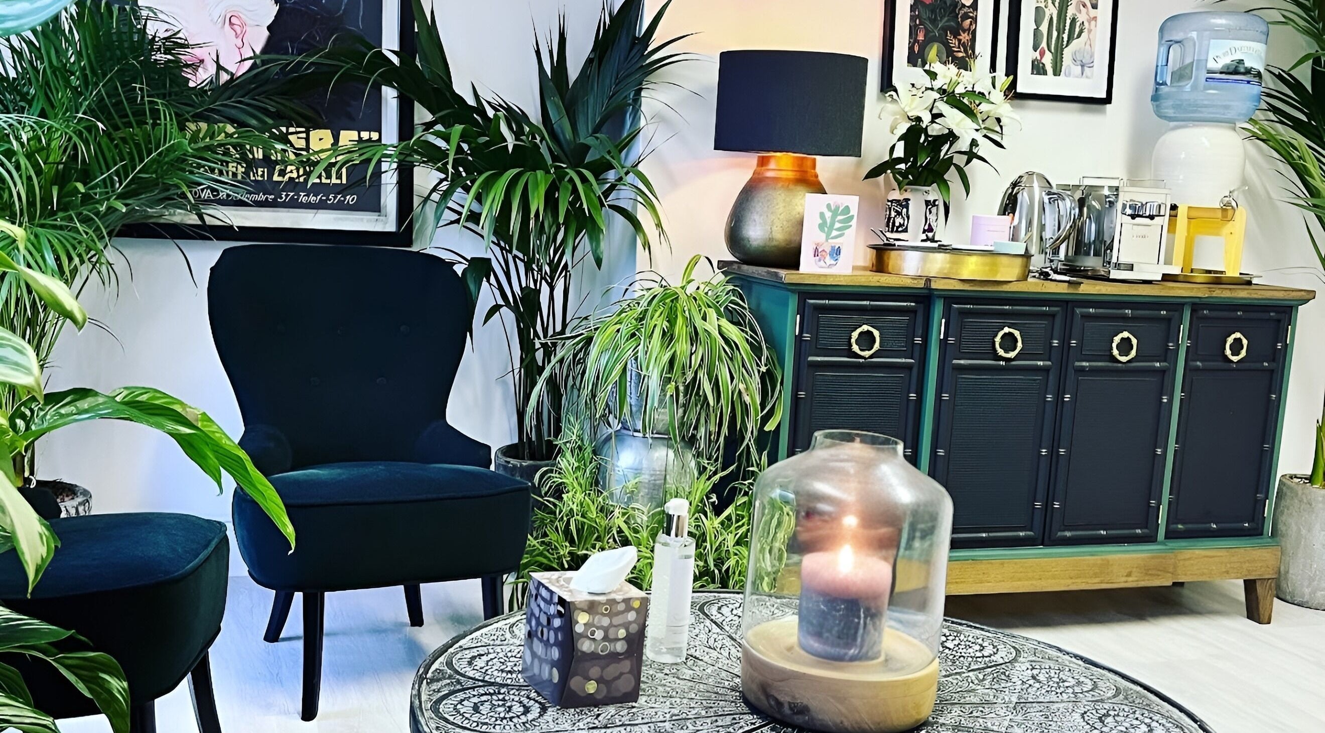 Chic lounge with plants and cozy seating at Fox and Ames, Exeter, England, GB. Perfect for relaxation.