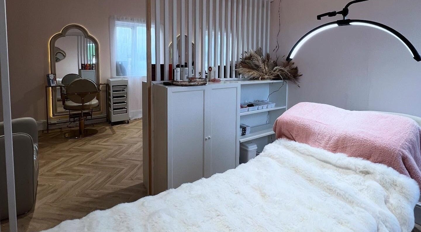 Cozy treatment room at By Becky Studios, Wells, England, GB with plush bed and elegant decor.