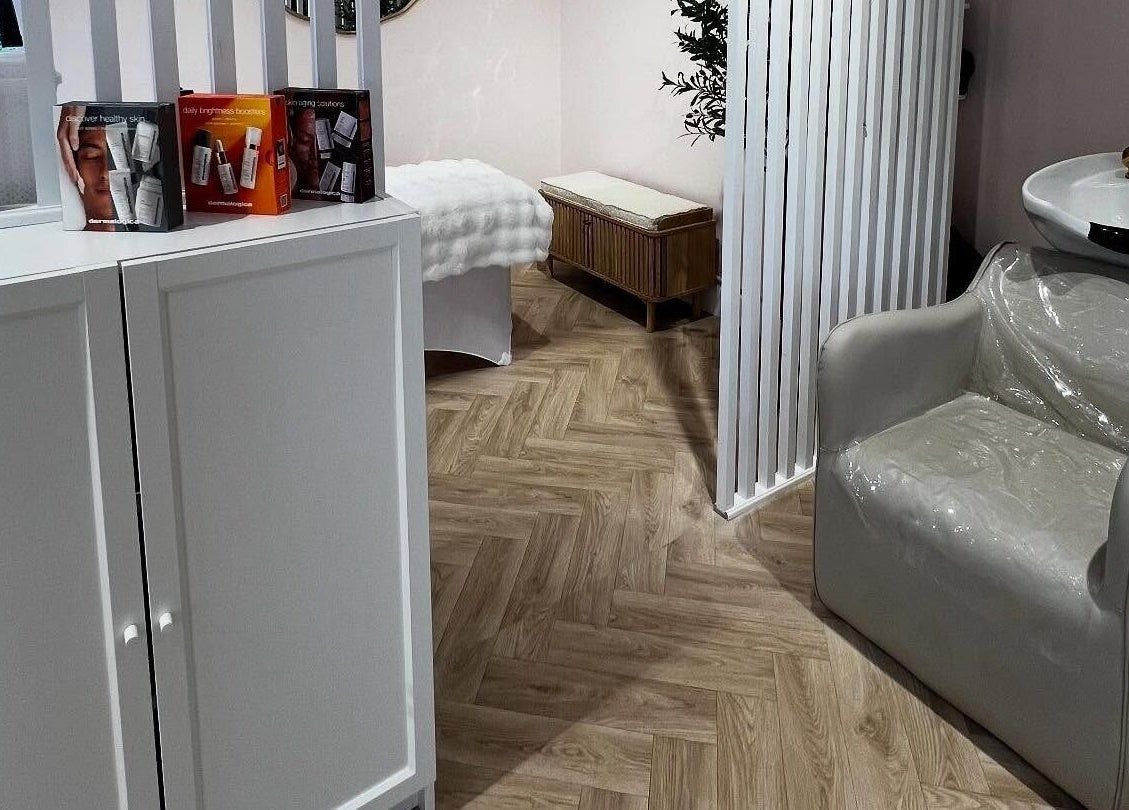 Relaxing salon interior at By Becky Studios, Wells, England, GB, featuring a wash station and treatment area.