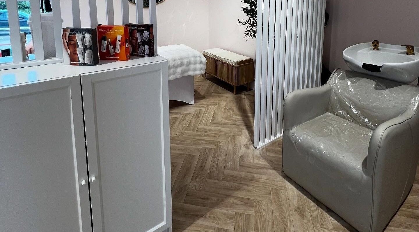 Relaxing salon interior at By Becky Studios, Wells, England, GB, featuring a wash station and treatment area.